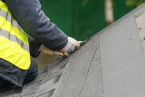 Roof Insurance Claim Roofer Repairing Storm Damage